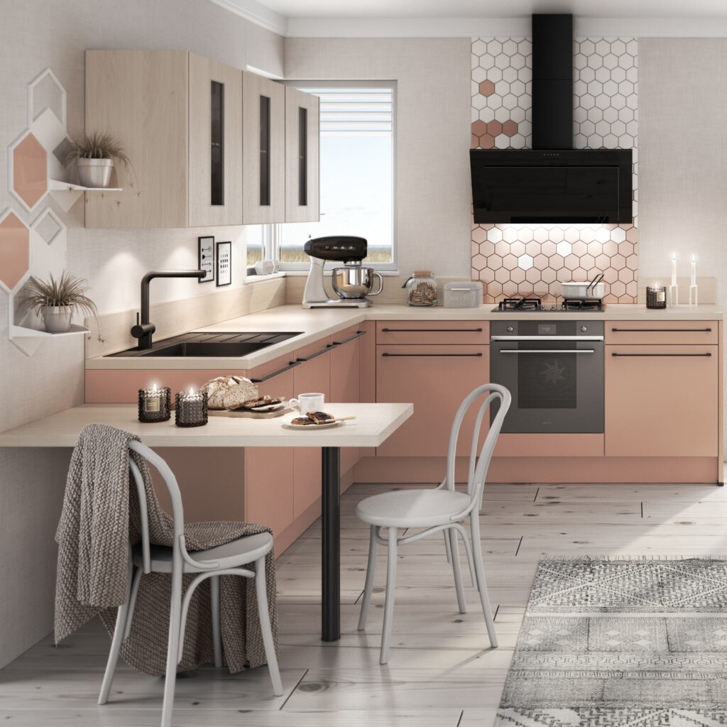 Eine moderne Küche mit rosa Schränken und Wabenfliesen wirkt freundlich und hell